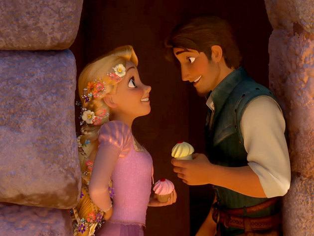 Rapunzel and Flynn Rider steal a sweet moment.